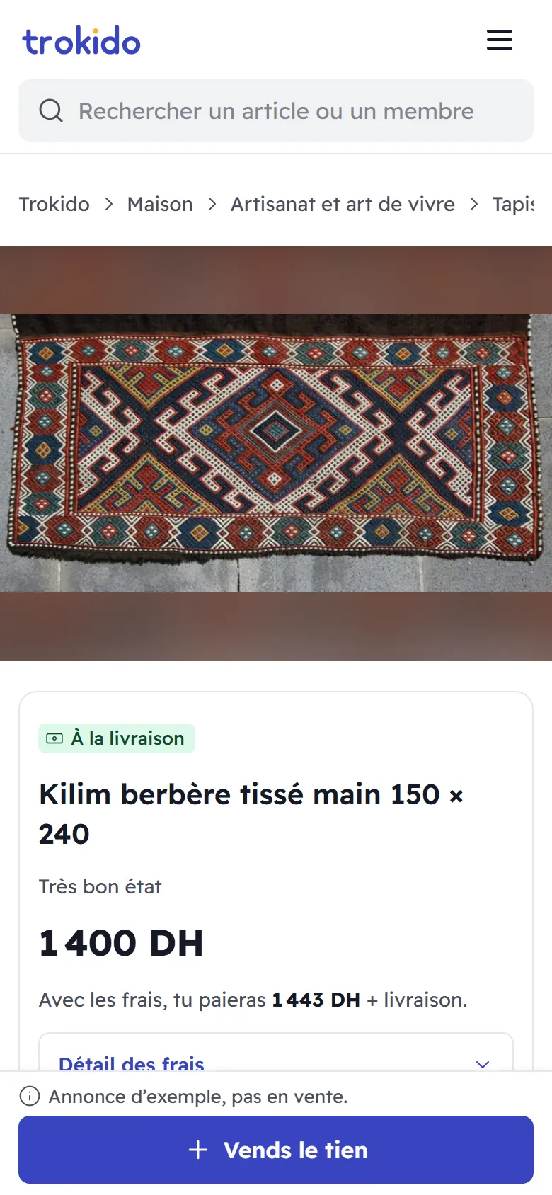 صفحة إعلان تجريبي على الهاتف: كليم أمازيغي منسوج يدوياً بمقاس 150 × 240 بثمن 1400 درهم مع عبارة إعلان تجريبي غير معروض للبيع